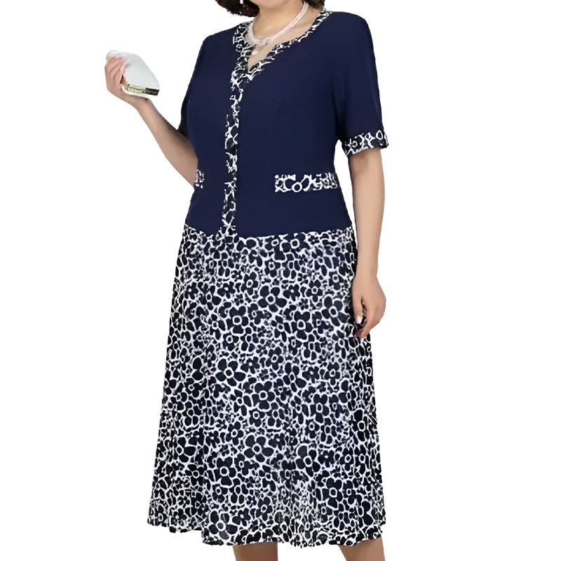 💥50% árcsökkentés🧥💼 Divatos, két részesnek tűnő egyberuha🌸✨ A-vonalú virágmintás ruha – a könnyed elegancia maga, minden testalkatra!
